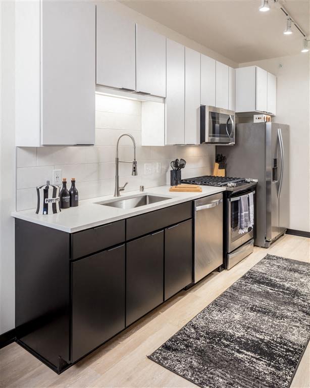updated kitchen with stainless steel appliances