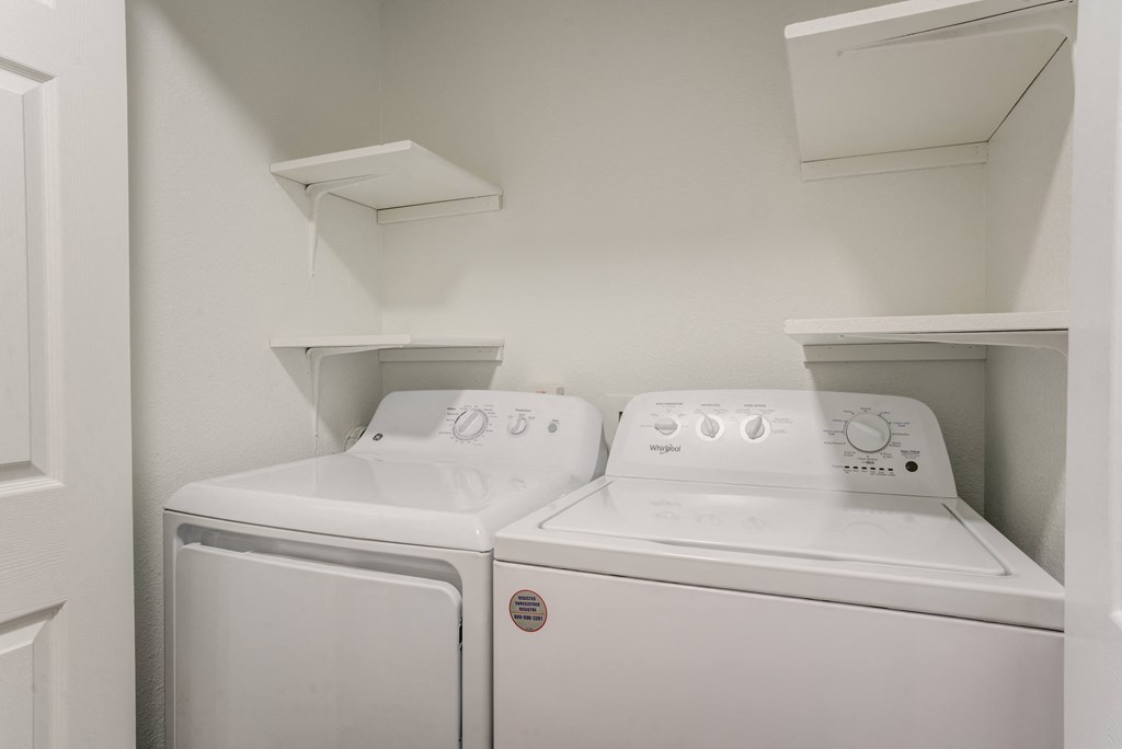 a washer and dryer in a laundry room