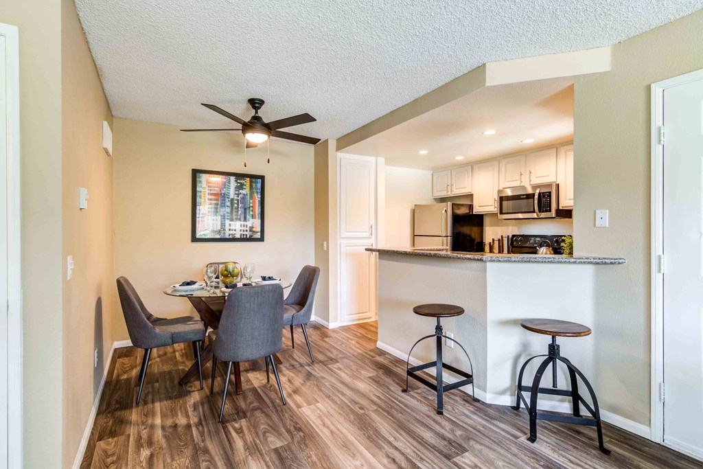 kitchen with stainless steel appliances and wood floors
