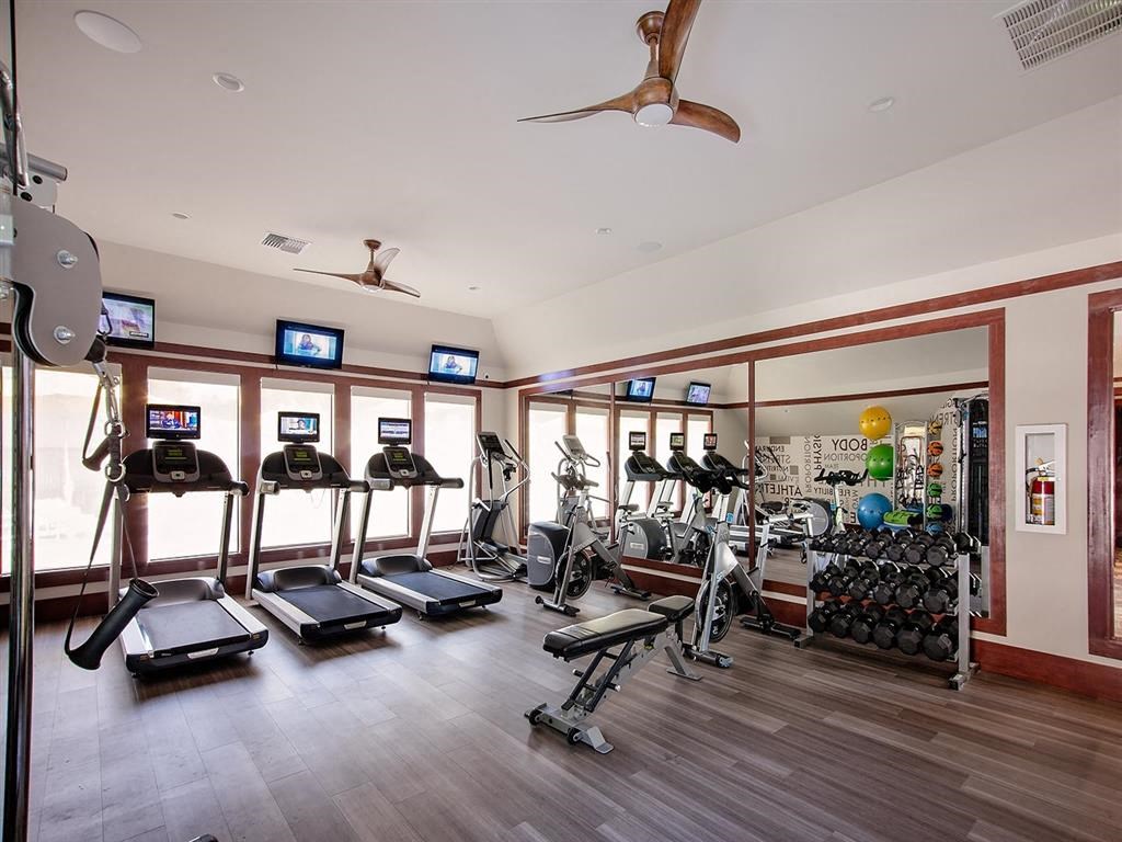 the gym in the condo has plenty of exercise equipment