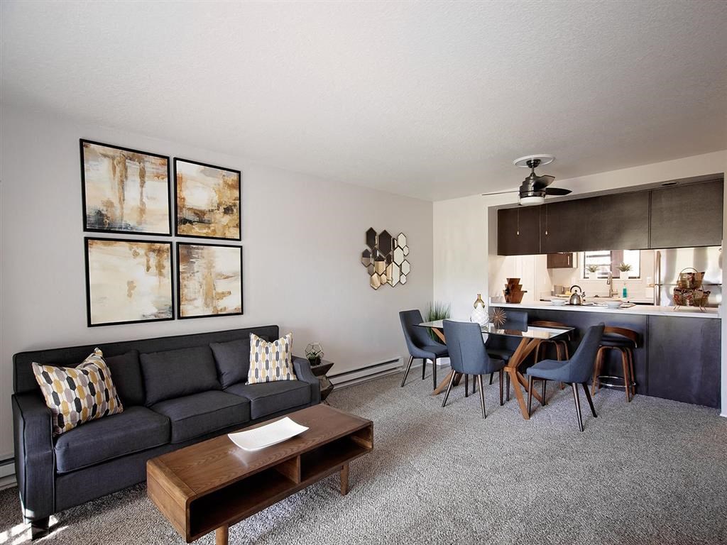 a living room with a couch and a table