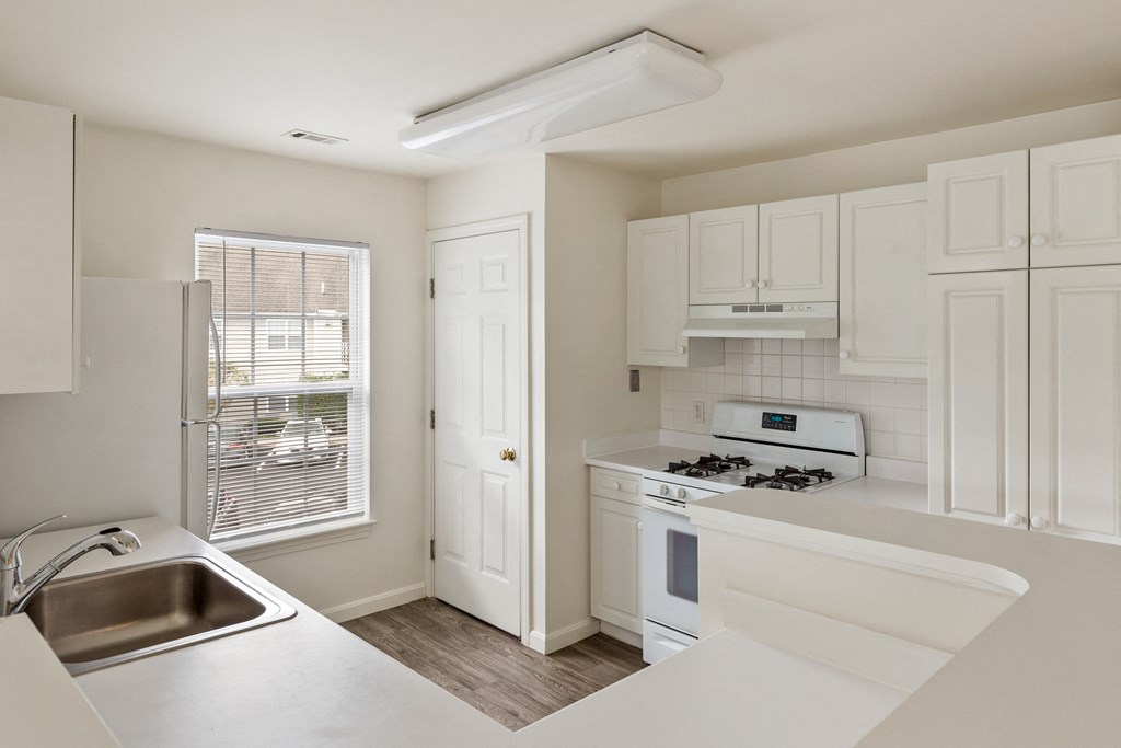 Orchards Apartments Marlborough ma apartment loft style apartments photo of kitchen with white appliances and white cabinets with wood floors and large window