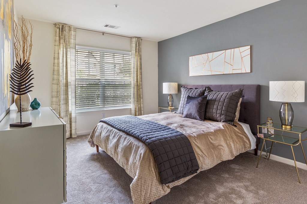 Orchards Apartments Marlborough ma apartment loft style apartments photo of large bedroom with windows and carpet with modern furniture