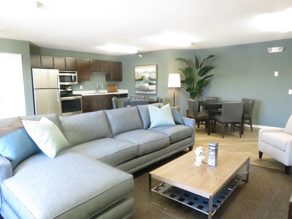 a living room with a couch and a table