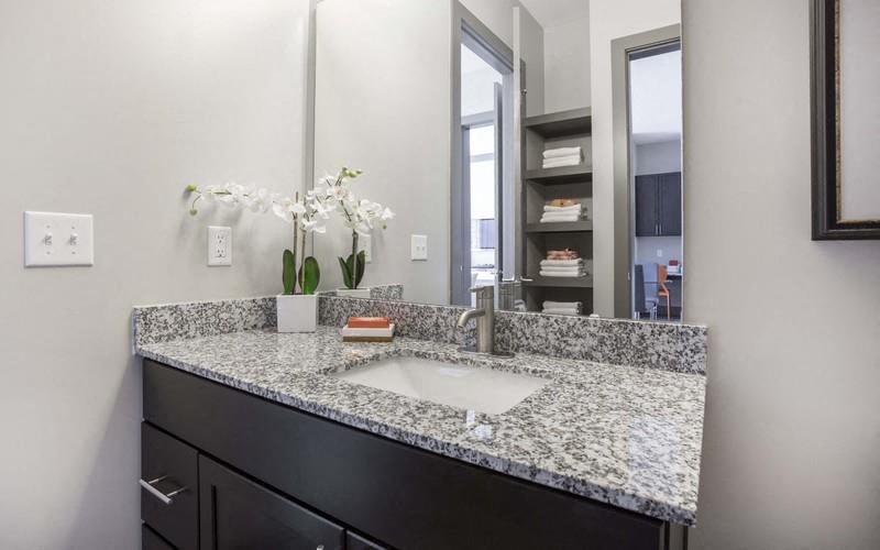 Octave Apartments in Nashville Tennessee photo of bathroom with granite countertops