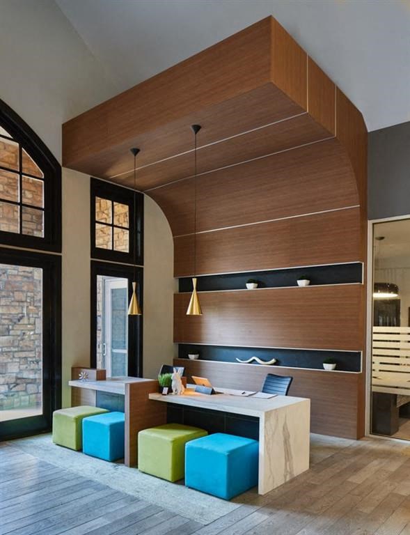 a kitchen with a counter and some stools