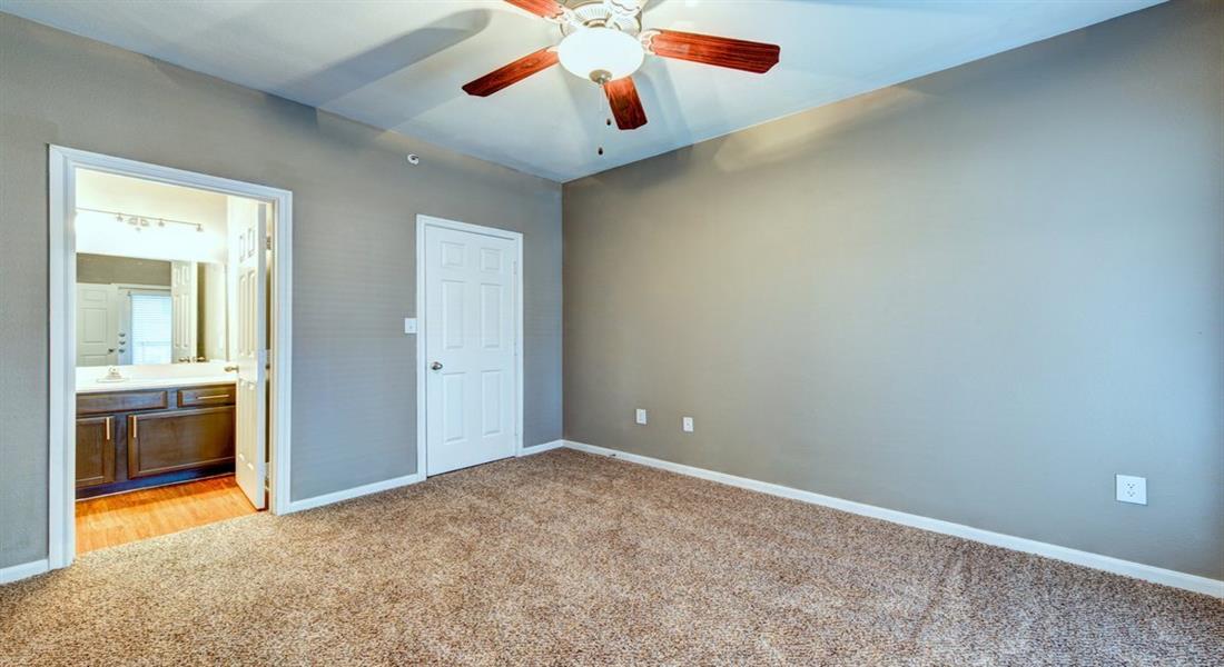 Bedroom with adjacent bathroom