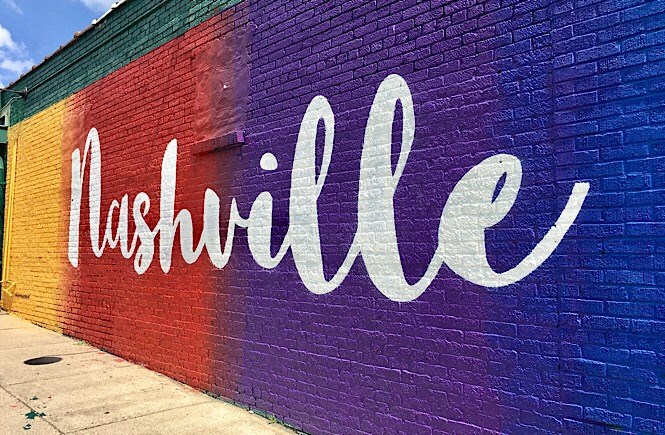 a colorful wall with the word fishbowl painted on it