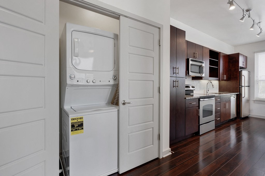 12 South Apartments - Nashville TN - kitchen with dark wood cabinets and stainless steel appliances