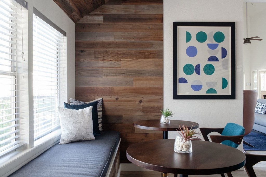 a living room with a couch and a table