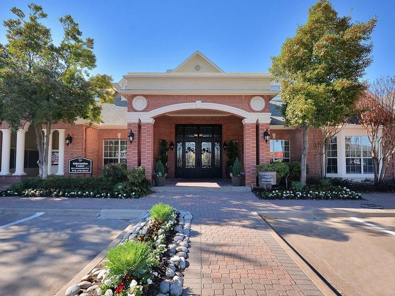 Plano, TX Apartments - Exterior View of Carrington Park Apartments Building Surrounded By Lush Landscaping