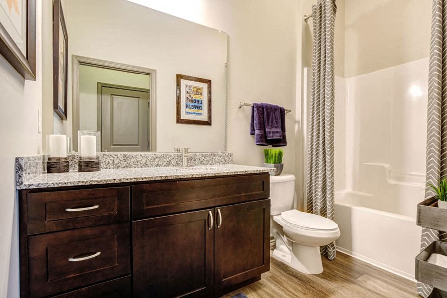 a bathroom with a toilet and a sink