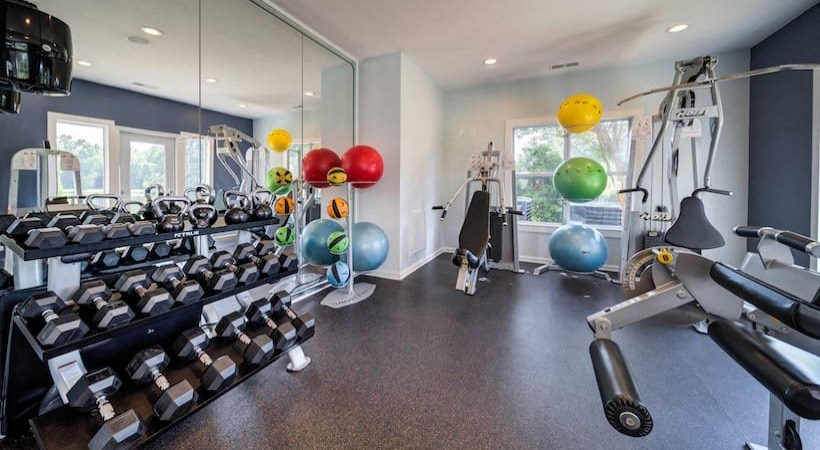 the gym is equipped with a variety of weights and cardio equipment