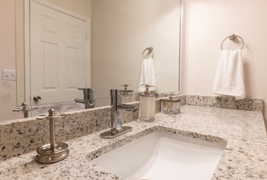 Webb Bridge Crossing Apartments in Alpharetta Georgia photo of a bathroom with a sink and a mirror