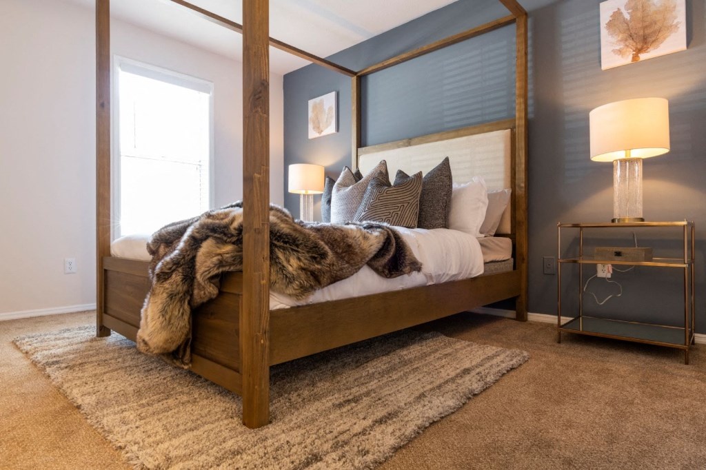 Pet-Friendly Apartments in Alpharetta, GA – Webb Bridge Crossing – bedroom with plush carpeting