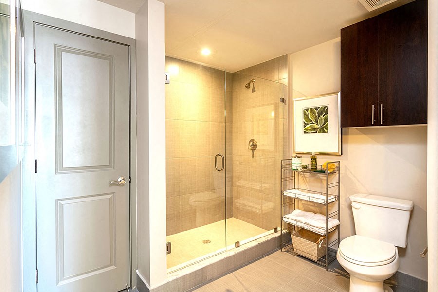 The Edge at Flagler Village Apartments in Fort Lauderdale, FL photo of a bathroom with a toilet and a shower