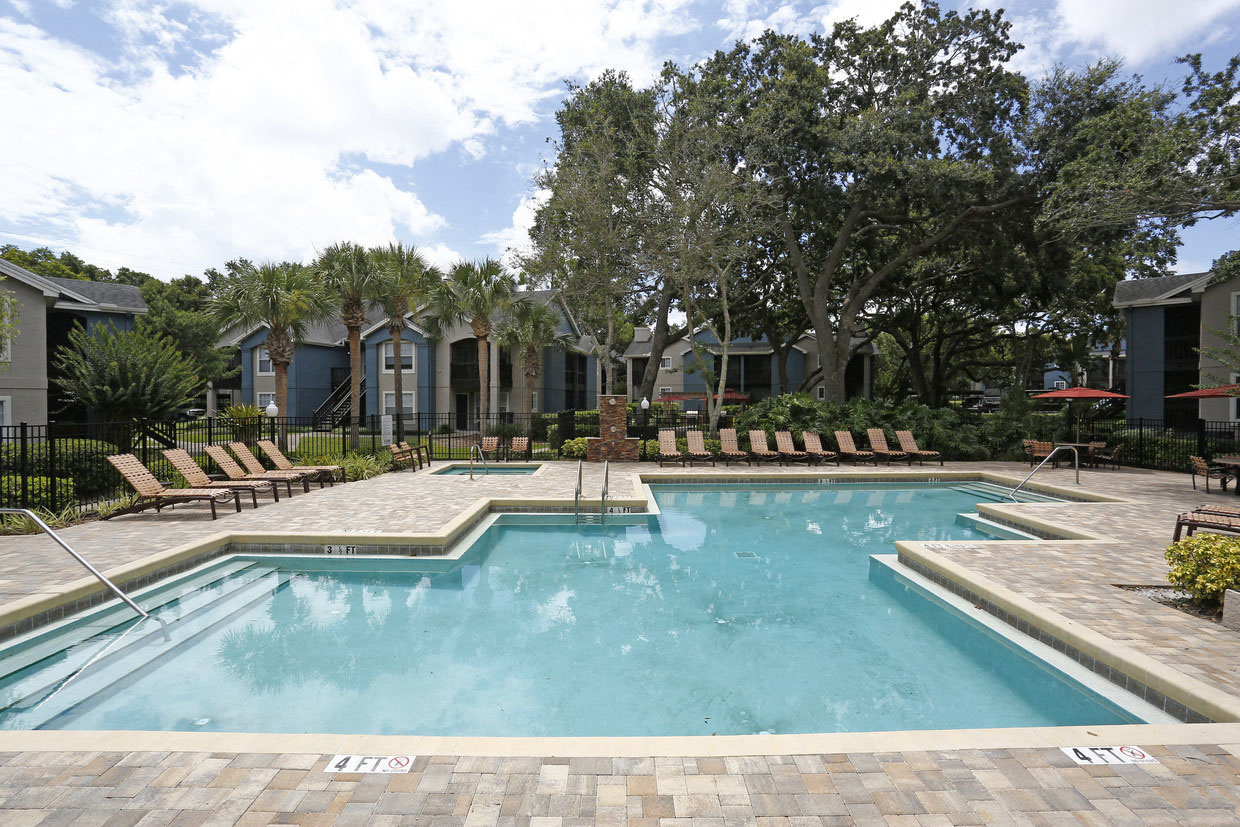 Stonegate Apartments in Palm Harbor, FL photo of Refreshing Swimming Pool and Jacuzzi