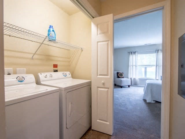 a white washer and dryer in a room