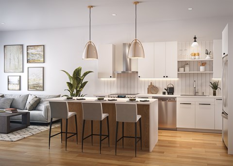 A modern kitchen with a dining table and chairs.