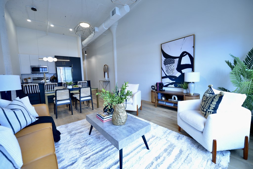 a living room with couches and a coffee table