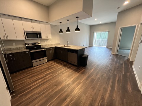 a kitchen and living room