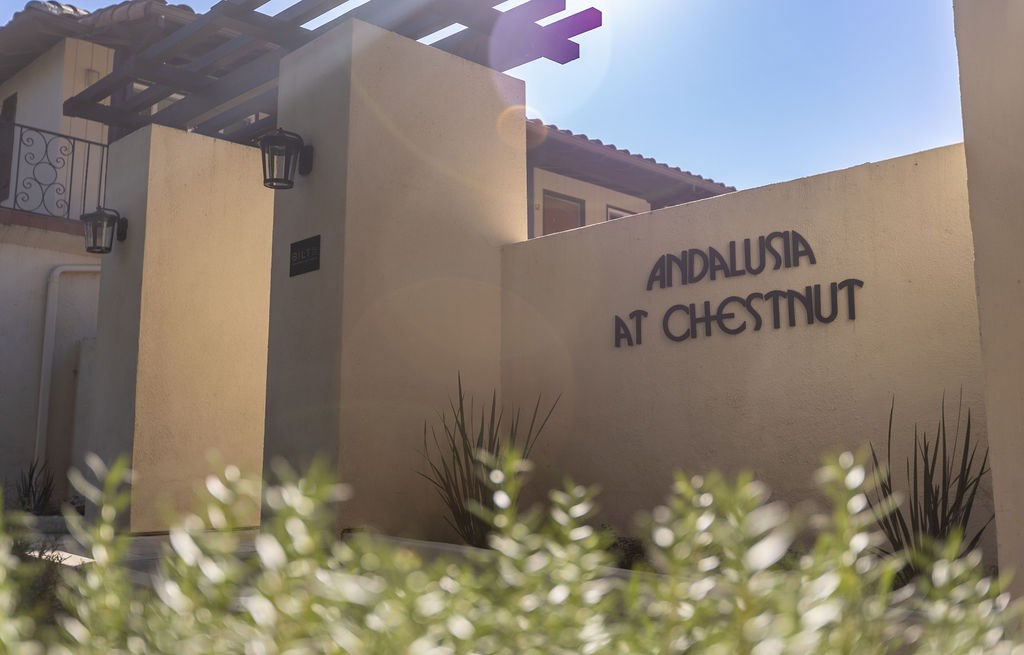 A wall with the words "Andalusia at Chestnut" written on it.