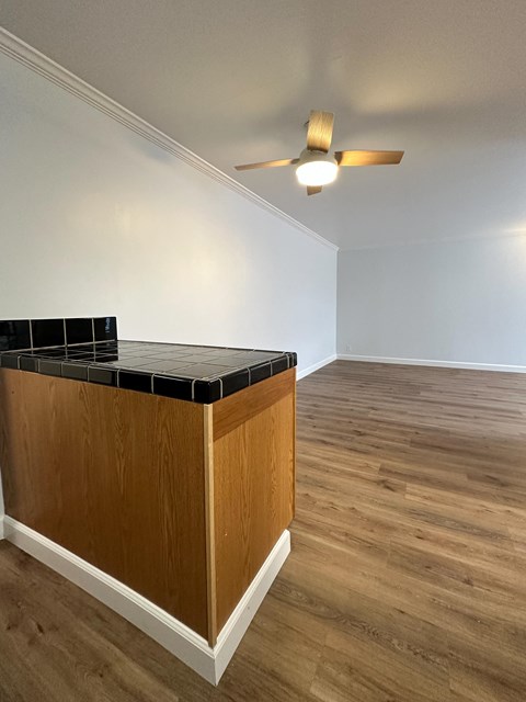 Open living space with tiled breakfast bar at The Chase Apartments Homes, Oakland, California