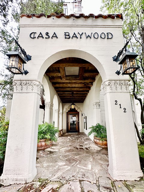 the archway of the casa baywood hotel entrance