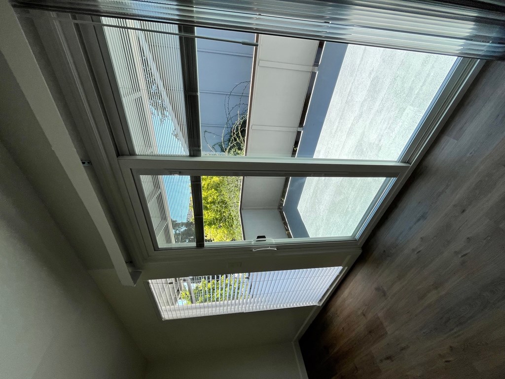 A modern interior with a skylight allowing natural light to enter.