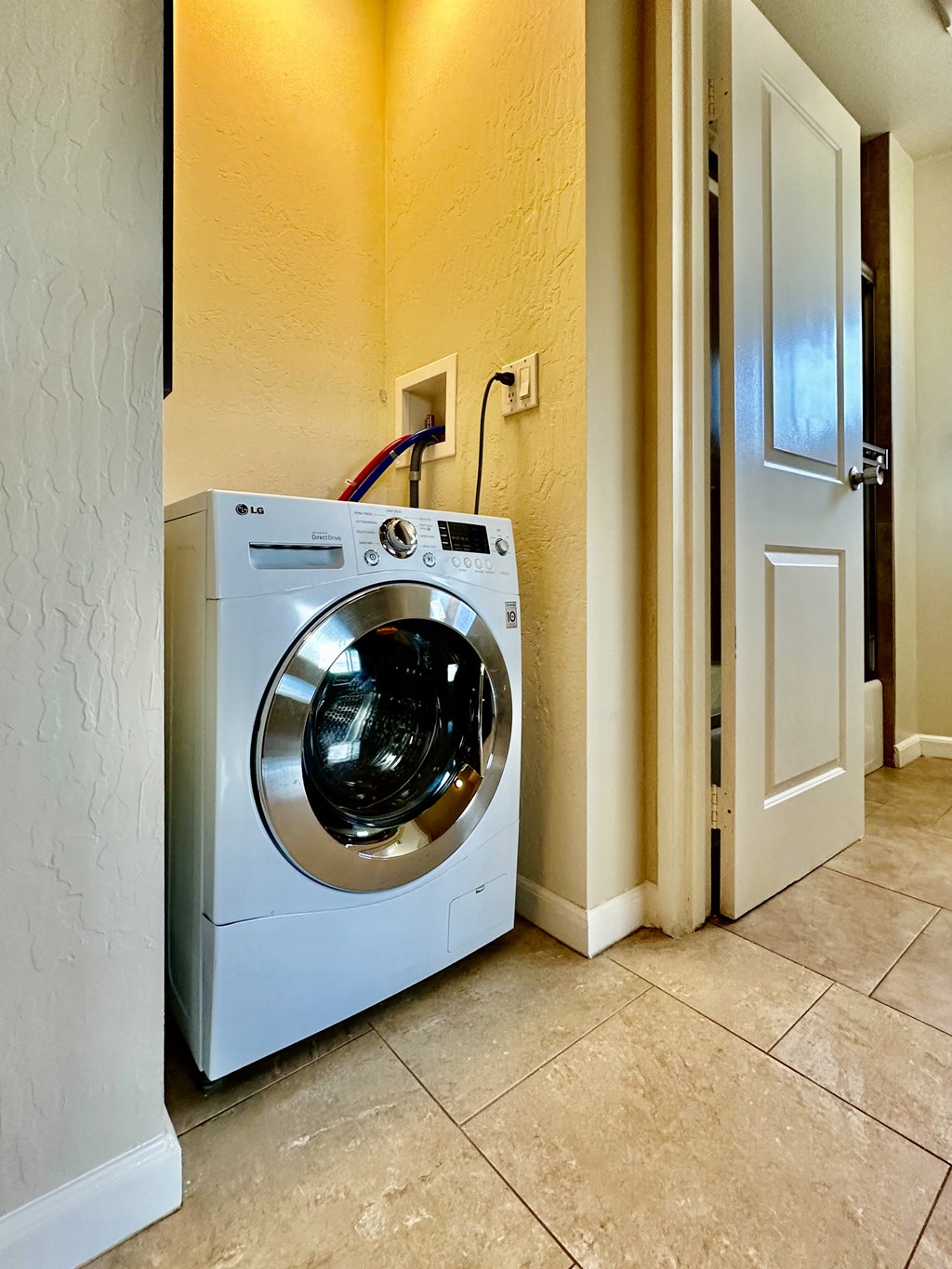 a washer and dryer in the laundry room of a home