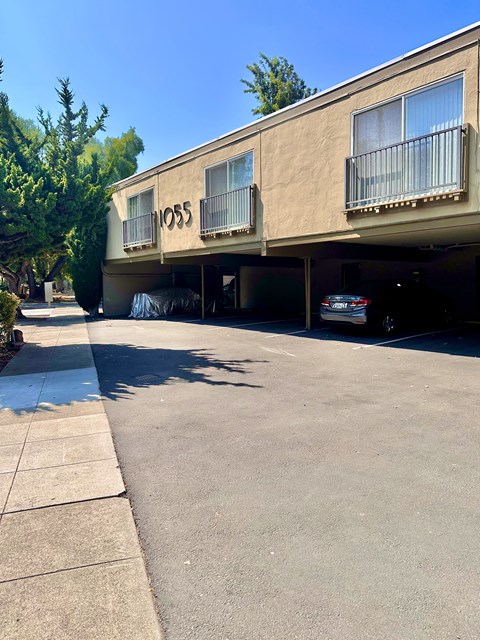 a parking garage with a sign that reads moss motel