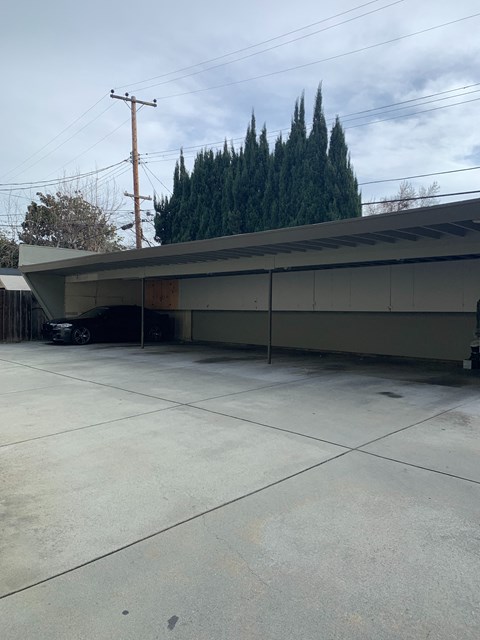 a building with a tree in the background