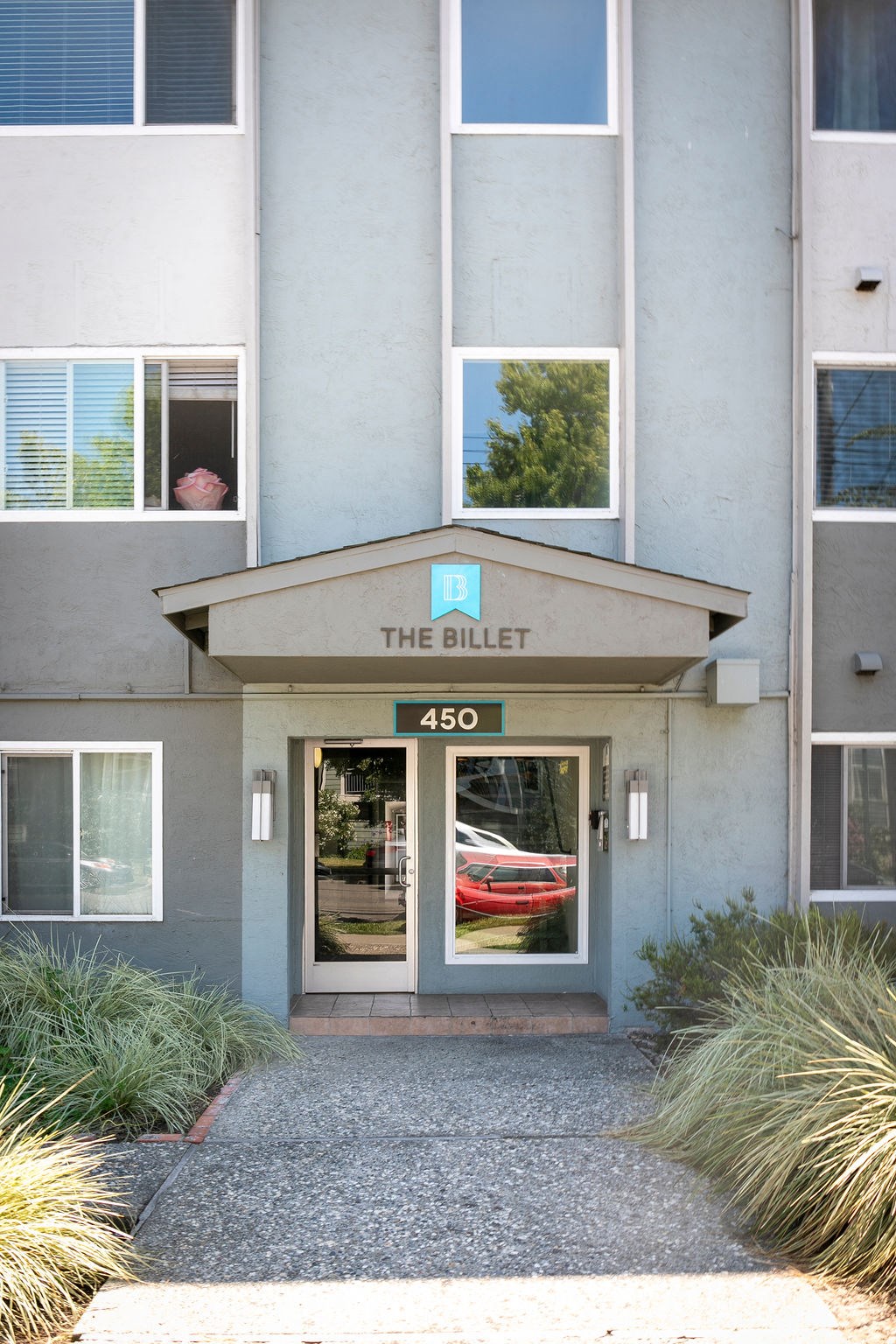 a collage of photos of a building with windows and plants