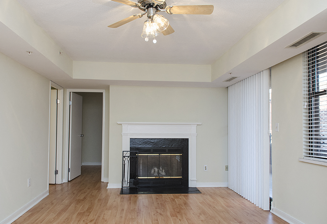 One-bedroom apartment living area with fireplace at 1633 Q, Washington