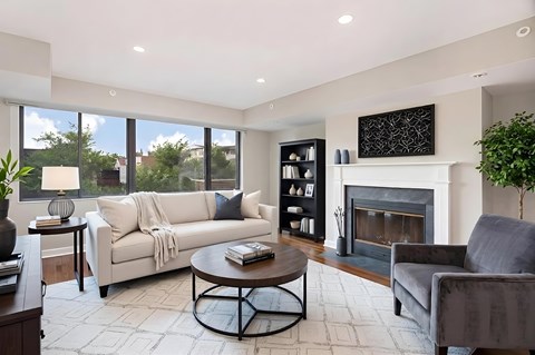 1633 Q living area with fireplace (virtually staged)