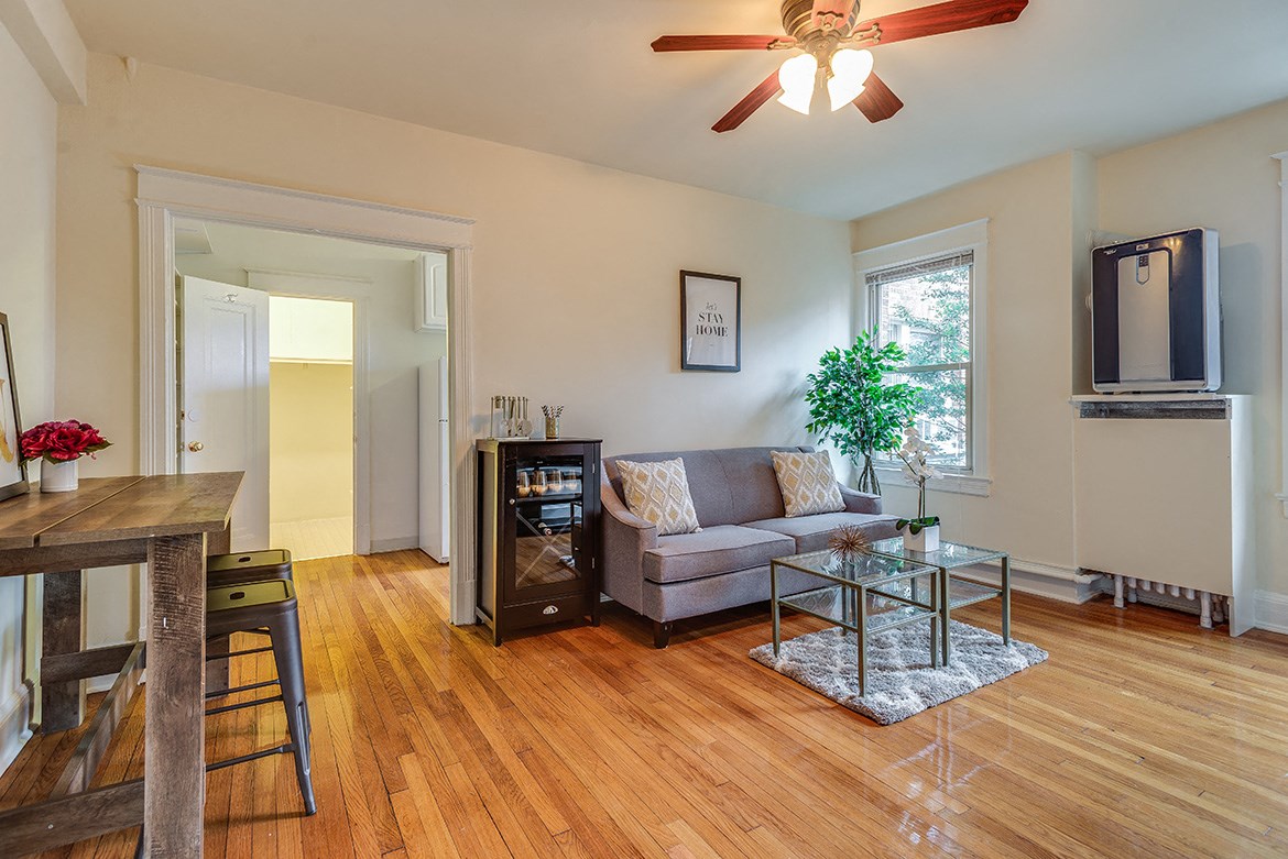 a living room with a couch and a table
