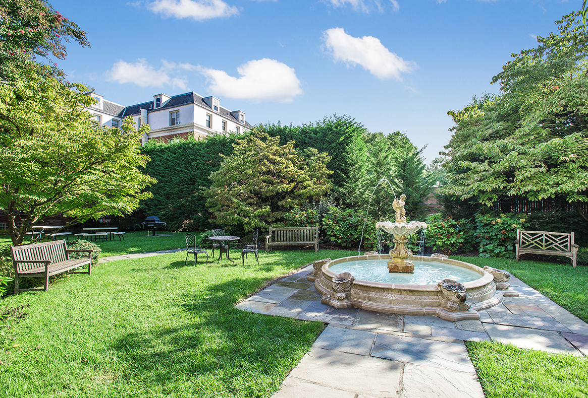 Courtyard with fountain and seating at Cathedral Mansions, Washington