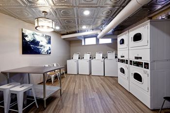 Laundry room with seating area at 4115 Wisconsin, Washington, DC