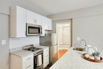 Updated kitchen with stainless steel appliances at The York and Potomac Park, Washington