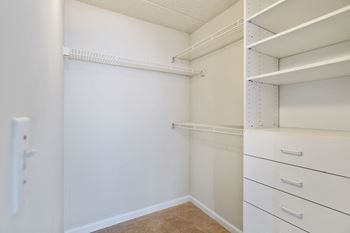 Walk-in closet with shelving and drawers  at Lenox Club, Arlington, VA