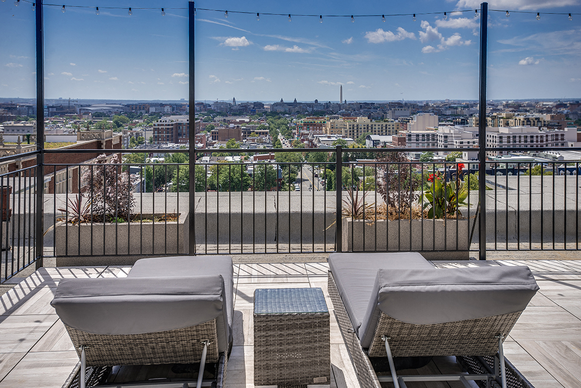 Rooftop deck with lounge chairs at Highview and Castle Manor, Washington, 20009