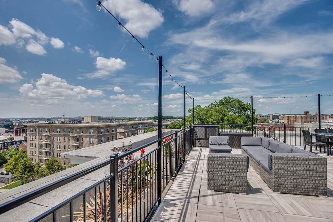 Rooftop deck with seating and lounge area at Highview and Castle Manor, Washington, DC, 20009