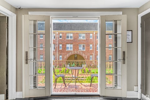 French doors looking out to the Kew Gardens Courtyard