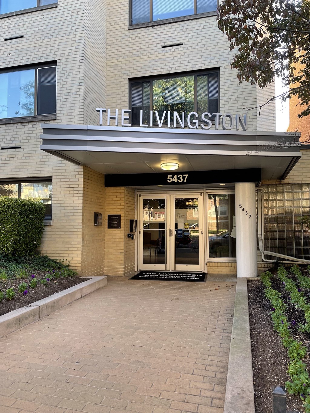 the entrance to the livingston apartment building