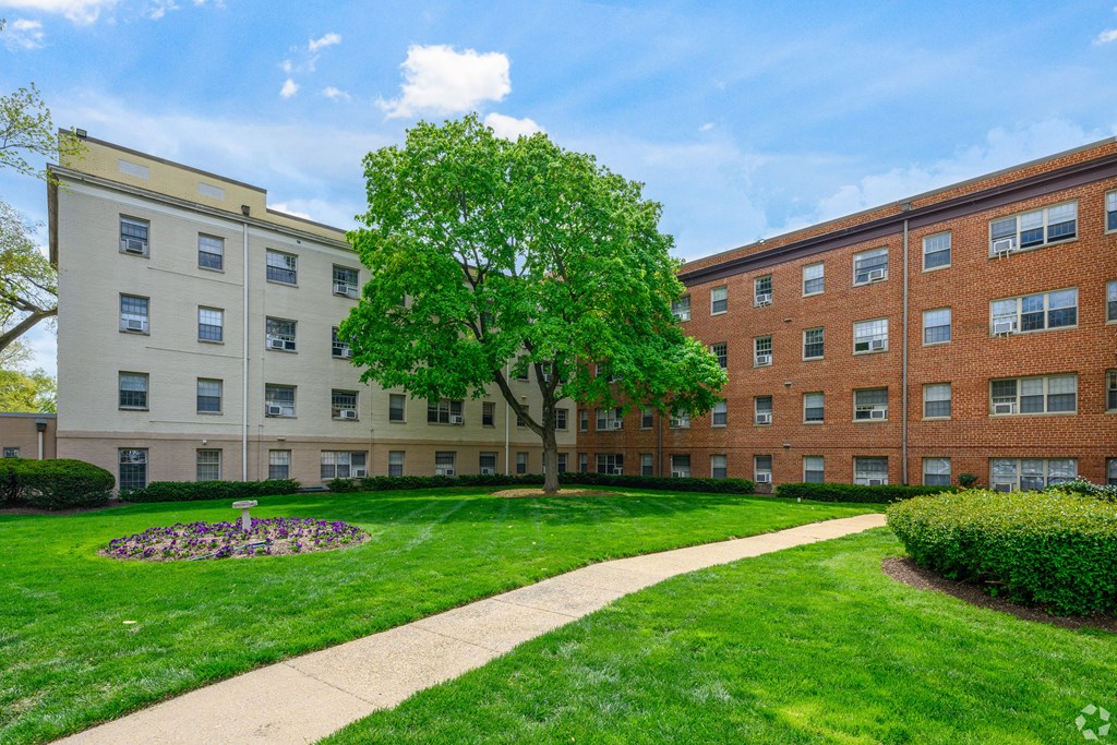 Building exterior with green lawn in Old Town Alexandria, VA.