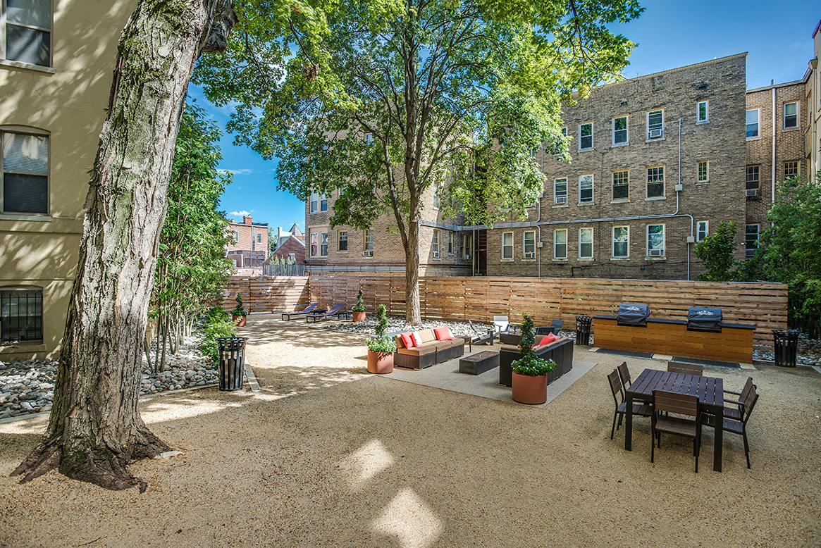 Courtyard with seating area and grills at President Madison, Washington, DC, 20009