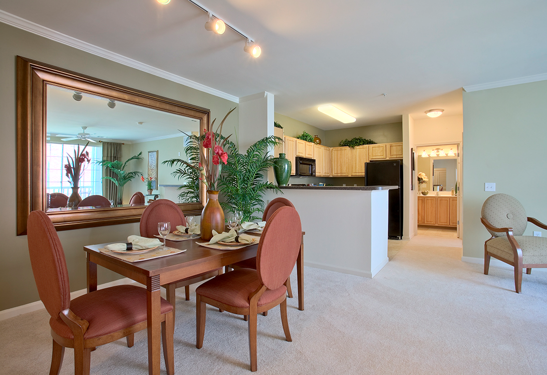 Apartment dining area and kitchen (staged) at The Residences at King Farm Apartments, Maryland, 20850