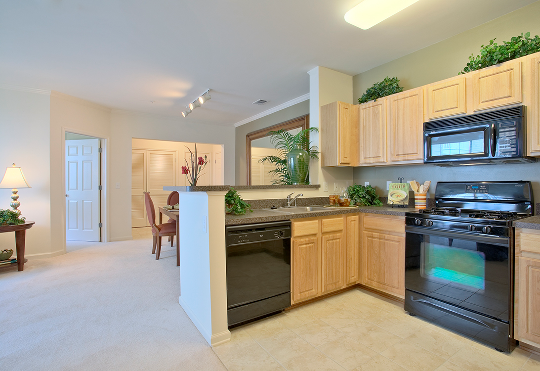 Apartment kitchen with classic finishes at The Residences at King Farm Apartments, Maryland