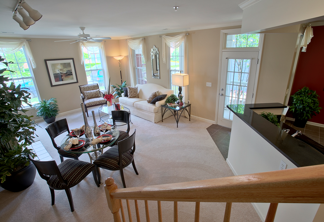  living and dining area (staged) at The Residences at King Farm Apartments, Rockville, Maryland