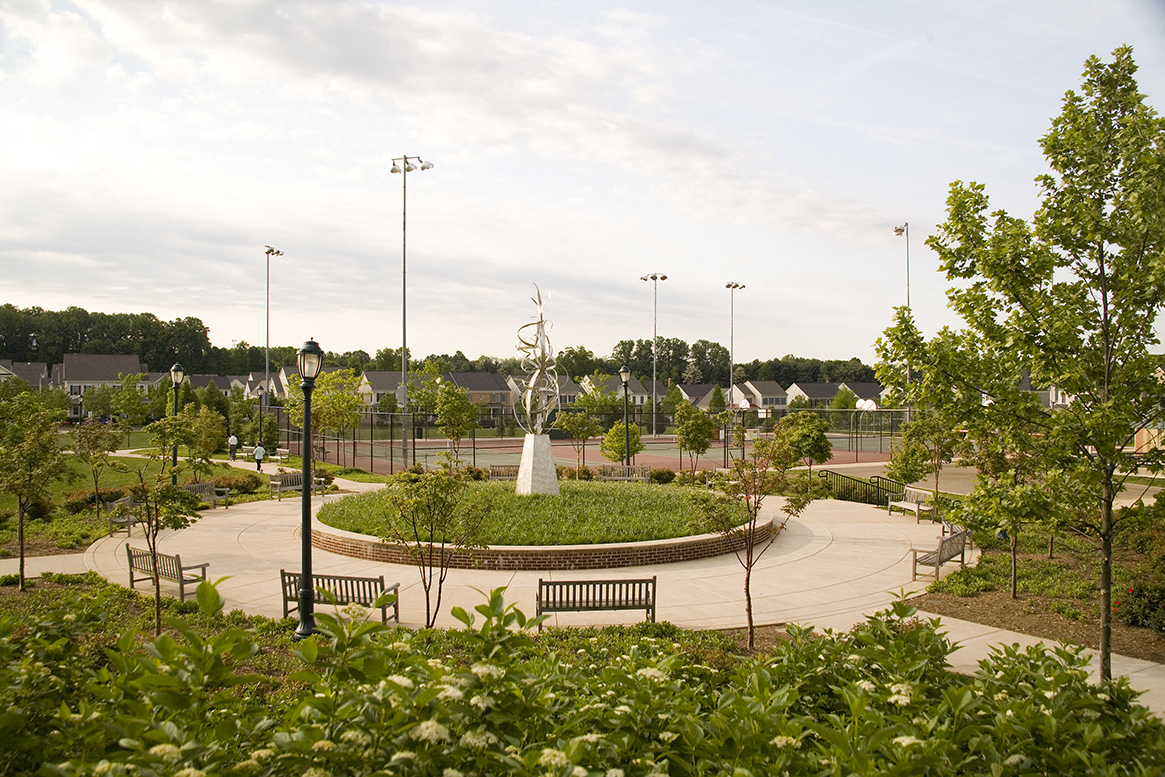 Sidewalks and seating area at The Residences at King Farm Apartments, Rockville, Maryland